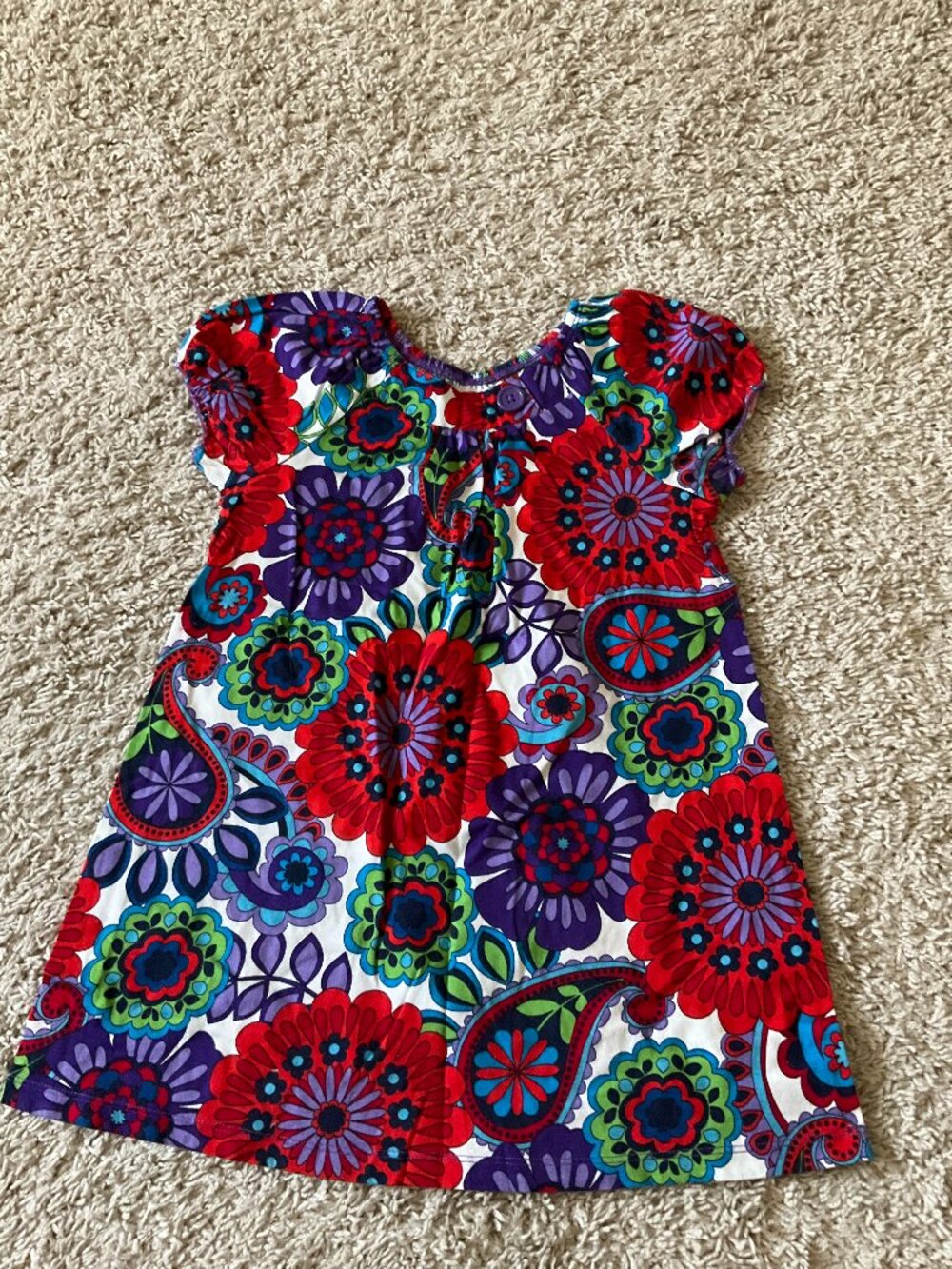 HANNA ANDERSSON DRESS IN FLORAL PRINT. SIZE: 120 (US 6).